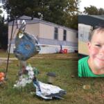 A memorial for 8-year-old Leland Arnett pictured in front of the trailer where the family lived on Hickory Street in DeSoto. (Photo by Brayden Guy, Daily Egyptian)