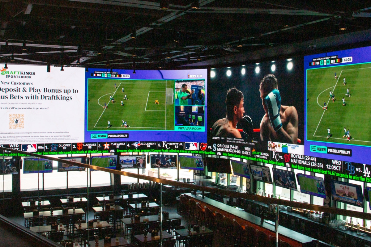 A massive 2,000-square-foot television wraps around the DraftKings Sports Bar at Wrigley Field. (Capitol News Illinois photo by Maggie Dougherty)