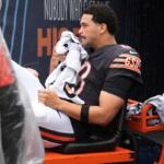 Chicago Bears quarterback Caleb Williams is carted off the field after an injury during the second half of an NFL football game against the Minnesota Vikings in Chicago, Sunday, Sept. 20, 2026. (AP Photo/Nam Y. Huh)