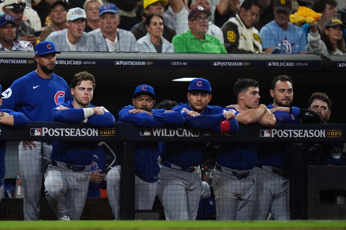 The Chicago Cubs dugout watches in the seventh inning against the San Diego Padres in Game 2 of the National League Wild Card baseball playoff series Wednesday, Sept. 30, 2026, in San Diego. (AP Photo/Gregory Bull)