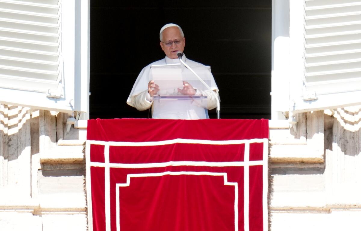 Pope Leo XIV delivers the Angelus prayer in St. Peter's Square at the Vatican, Sunday, Oct. 11, 2026. (AP Photo/Gregorio Borgia)