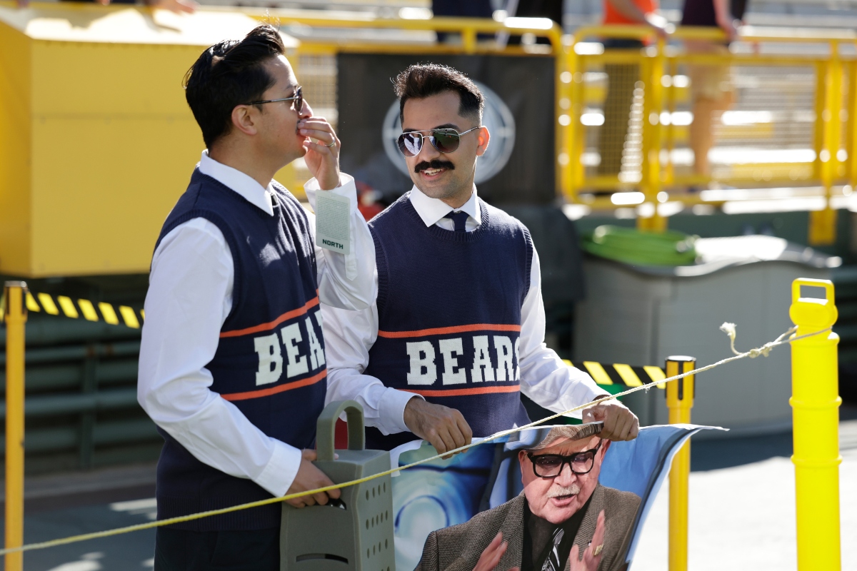 Chicago Bears fans dress up as Mike Ditka before an NFL football game against the Green Bay Packers in Green Bay, Wis., Sunday, Oct. 11, 2026. (AP Photo/Matt Ludtke)