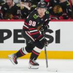 FILE - Chicago Blackhawks center Connor Bedard handles the puck during the second period of an NHL hockey game against the Colorado Avalanche, March 20, 2026, in Chicago. (AP Photo/Erin Hooley, File)