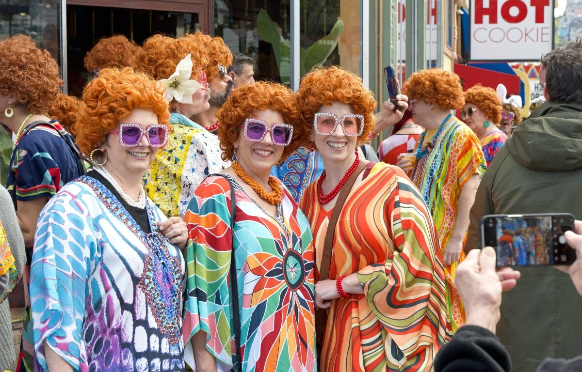 San Francisco, CA - March 30, 2024: Unidentified participants in a wild Mrs Roper Castro Bar Crawl hanging out in the Castro supporting local businesses, promoting friendship and community.