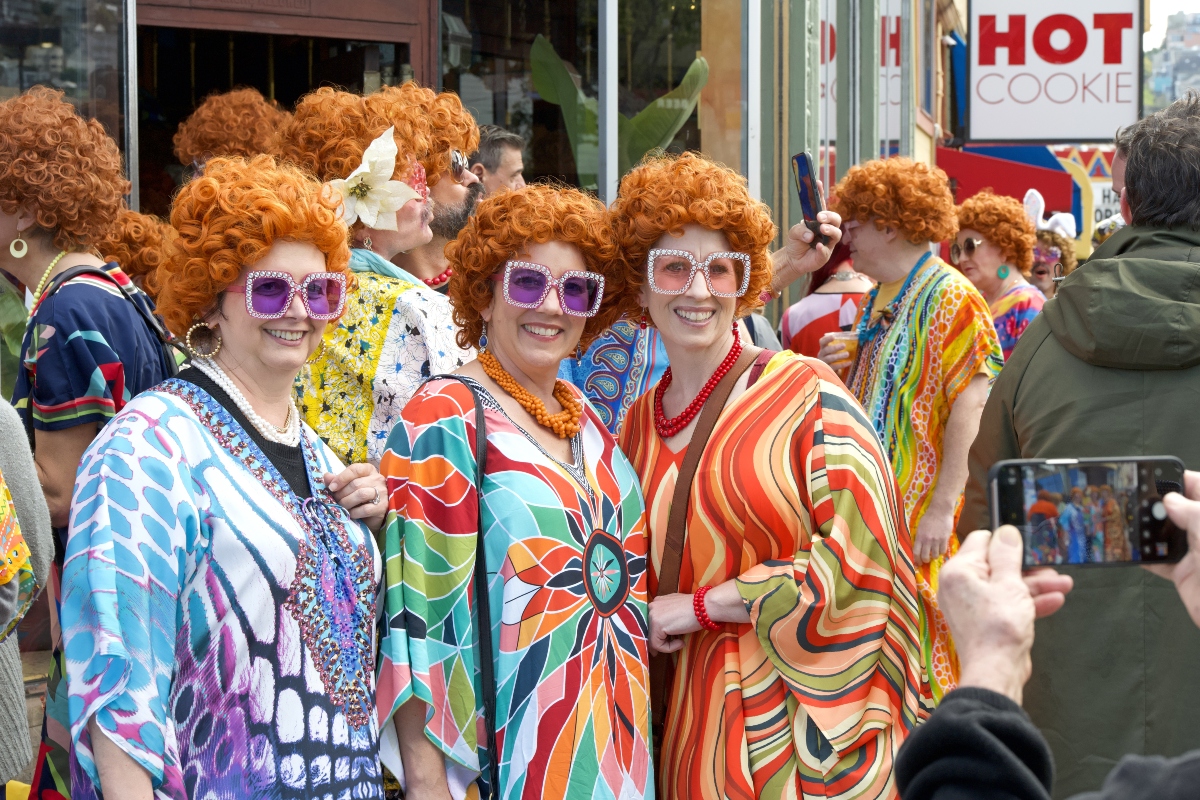 San Francisco, CA - March 30, 2024: Unidentified participants in a wild Mrs Roper Castro Bar Crawl hanging out in the Castro supporting local businesses, promoting friendship and community.
