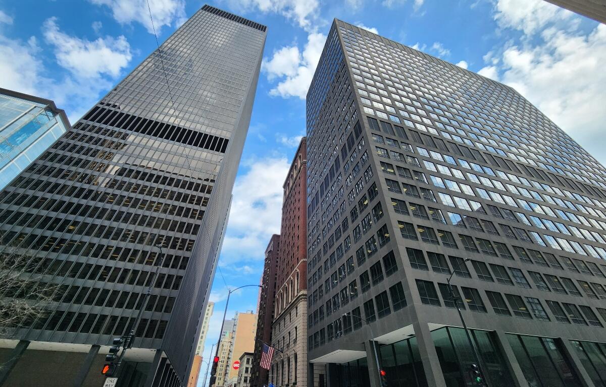 Chicago, IL April 22, 2025, John C. Kluczynski Federal Building and Ralph H. Metcalfe Federal Building, side by side, across the street, government, downtown, loop, business, district