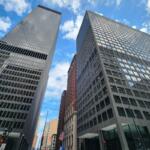 Chicago, IL April 22, 2025, John C. Kluczynski Federal Building and Ralph H. Metcalfe Federal Building, side by side, across the street, government, downtown, loop, business, district